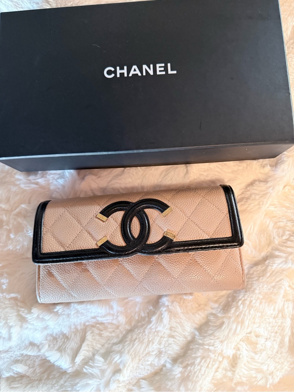 CHANEL Filigree Beige Quilted Leather Wallet with Black Trim and Gold Accents